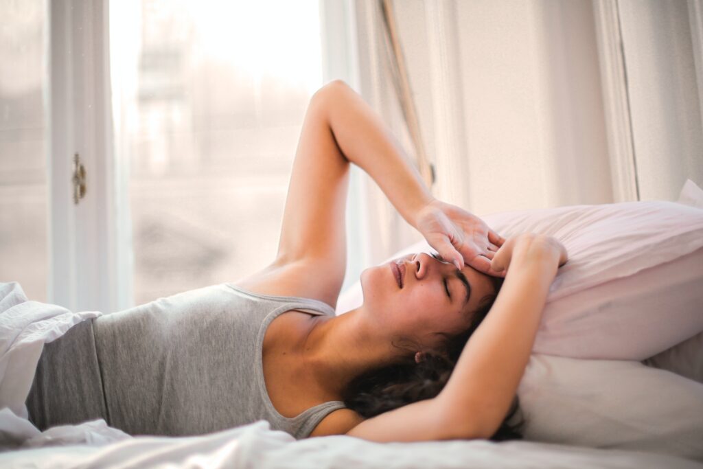 woman waking up after a good night's sleep