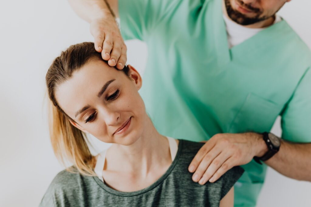 woman receiving treatment for neck pain