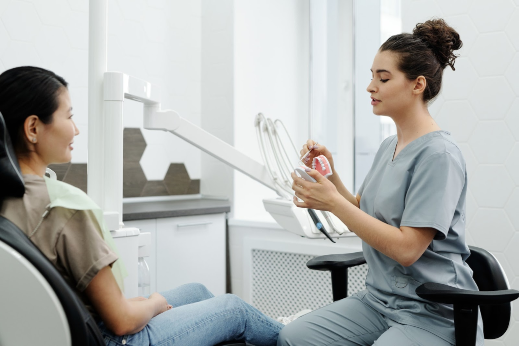 dentist explaining procedure to a patient at a dental practice