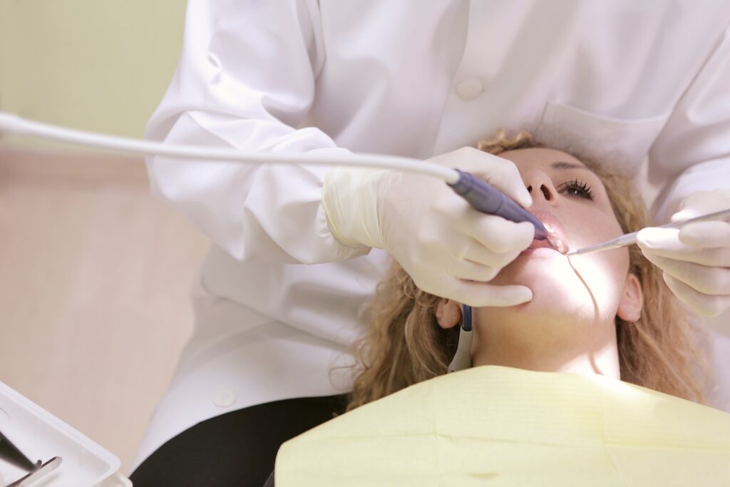 woman receiving a dental cleaning